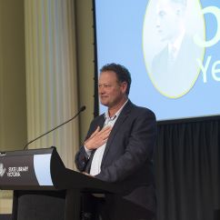 Michael Dal Zotto, ISSI fellow speaking at lectern. 