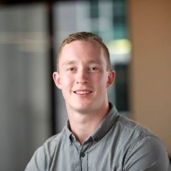 Stirling Jeans, RMIT University scholar. Young man in grey shirt. 