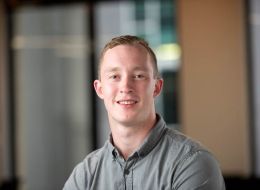Stirling Jeans, RMIT University scholar. Young man in grey shirt. 