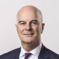 Headshot of middle-aged man in a suit