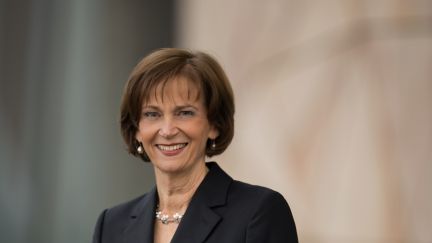 Hedshot of middle-aged woman wearing a suit