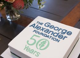 Cake with The George Alexander Foundation's 50th Anniversary commemorative logo