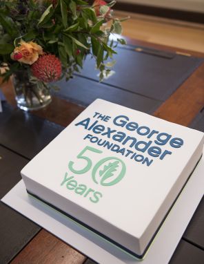 Cake with The George Alexander Foundation's 50th Anniversary commemorative logo