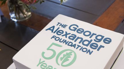 Cake with The George Alexander Foundation's 50th Anniversary commemorative logo