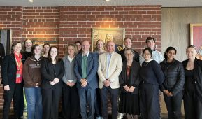 A group of 16 unviersity students with representatives from Deakin and the Foundation