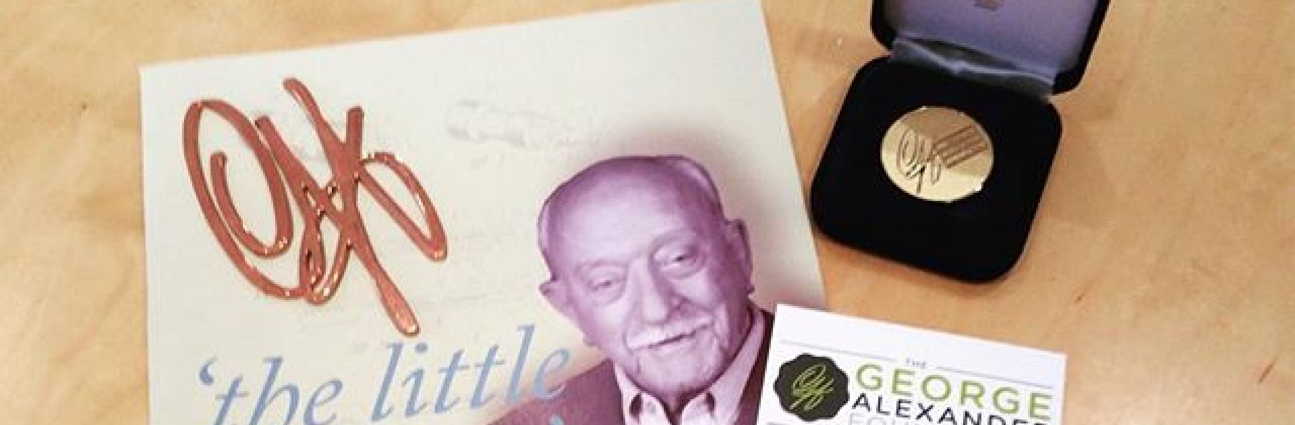 A copy of the Little Brother biography of George Alexander plus a GAF medallion